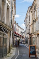 brown and white concrete building during daytime