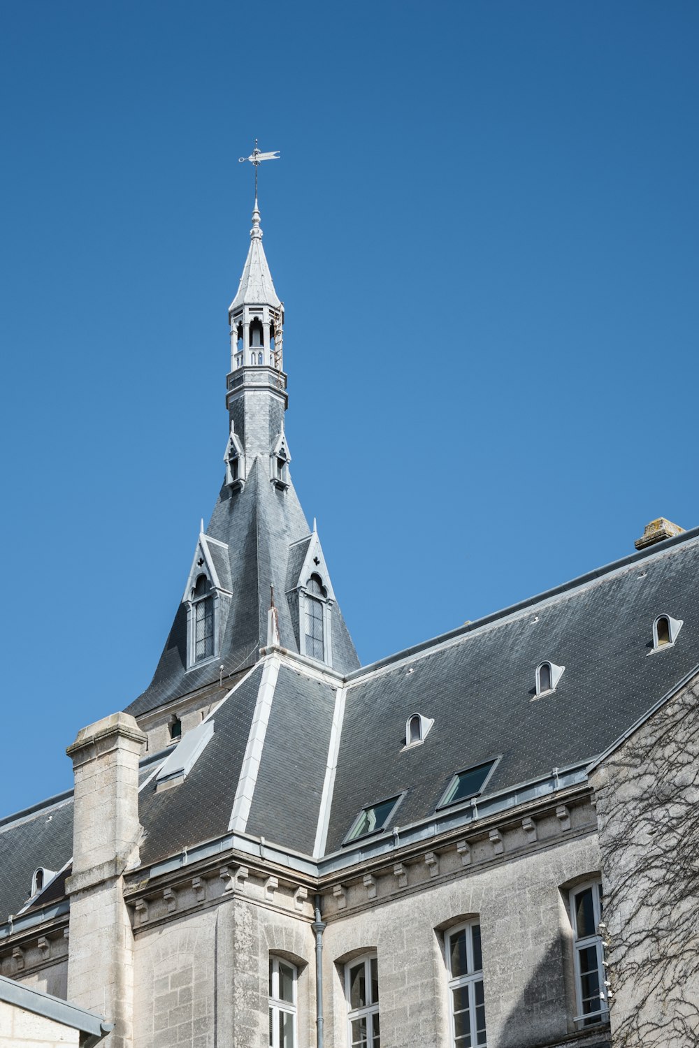 grey concrete building under blue sky during daytime