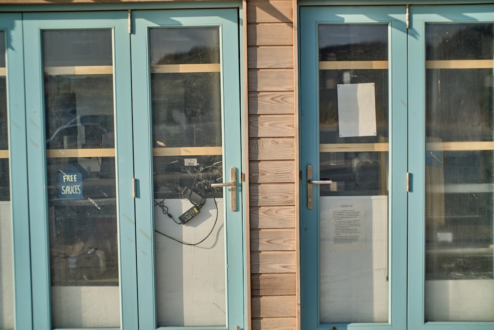 white wooden framed glass door