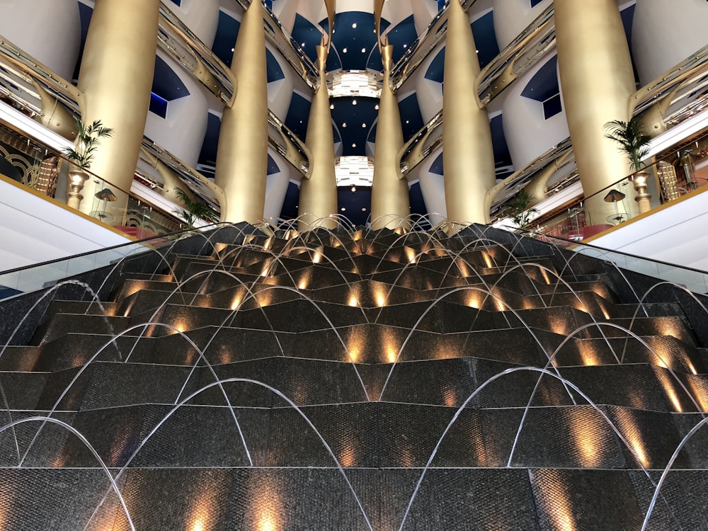 gold round ball decor on glass building