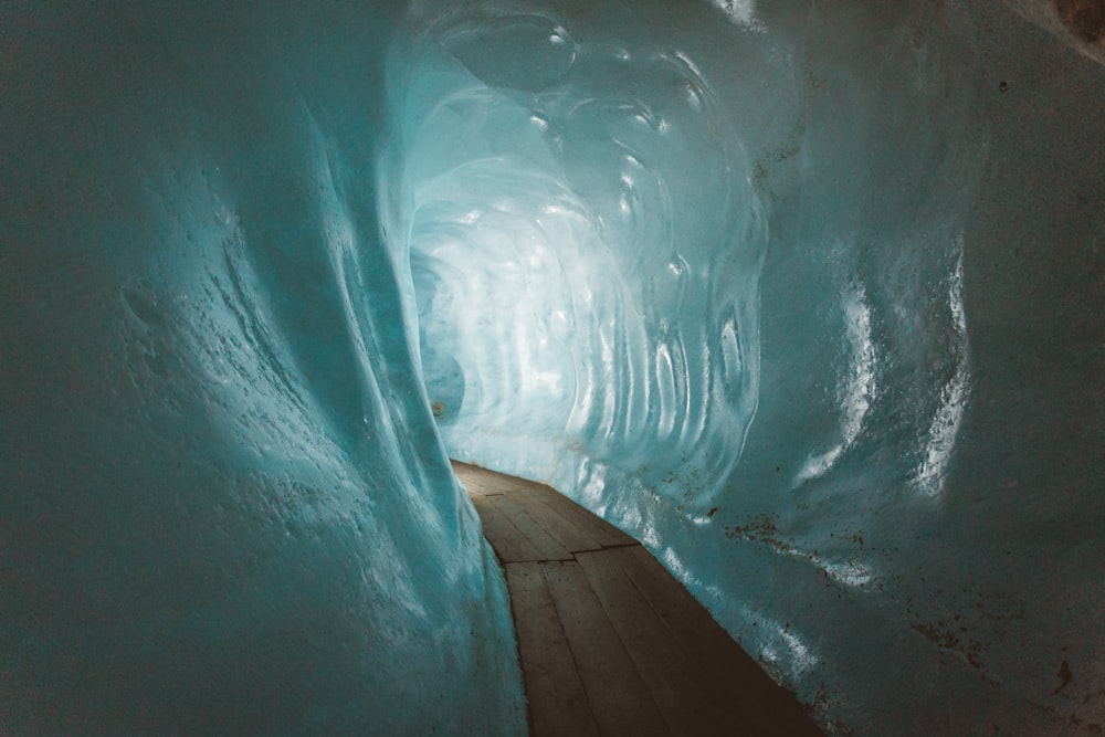 blue water on brown wooden floor