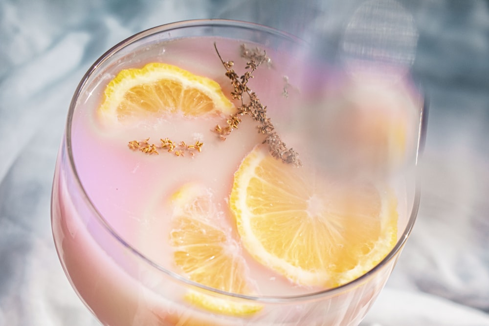 clear drinking glass with orange juice