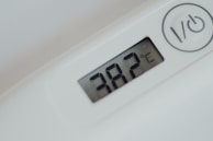 white thermostat at 20 5