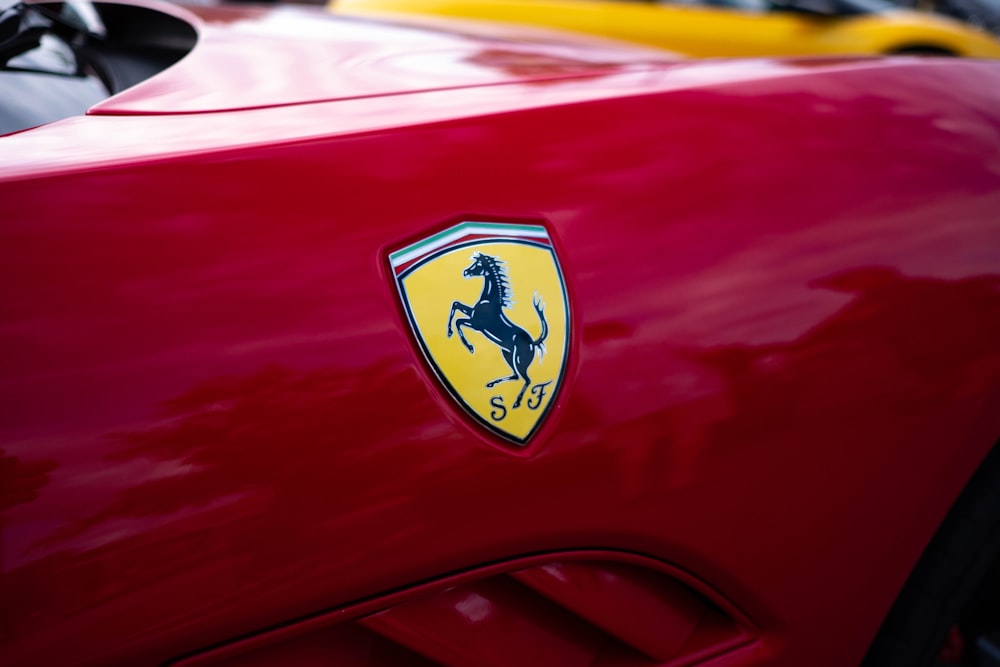 red and yellow car in close up photography