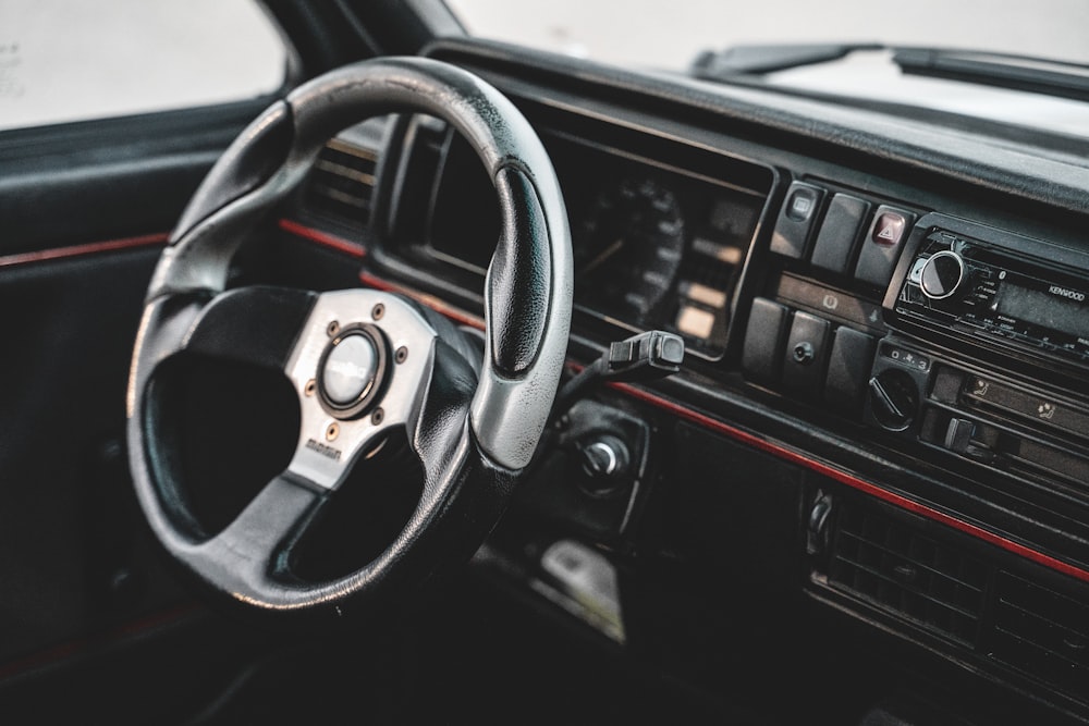 black and silver steering wheel