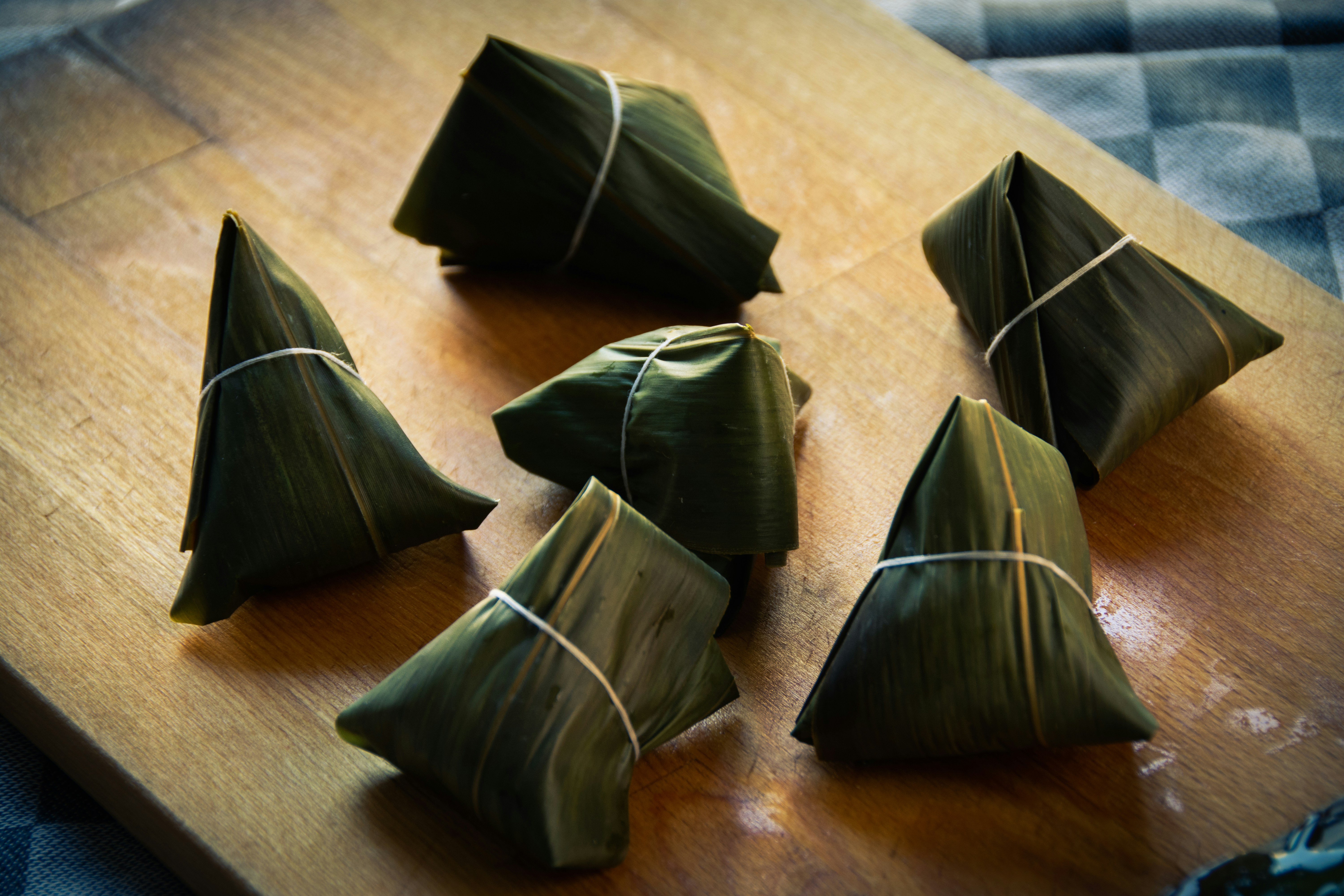 traditional zongzi sticky rice dumplings bamboo leaves preparation