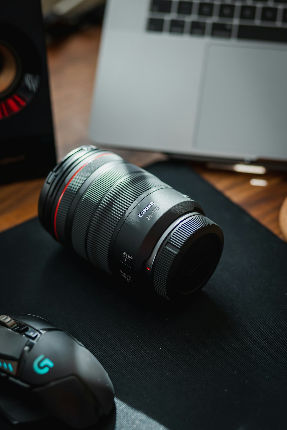 black camera lens on black table