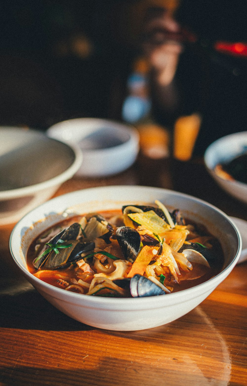 white ceramic bowl with noodle dish