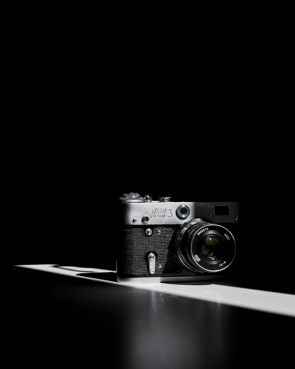 black and silver dslr camera