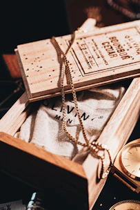 A beautifully packaged jewellery box adorned with moon phase motifs ready for shipping.