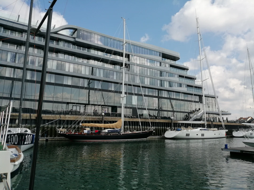 Yachts moored in front of a hotel at Ocean Village