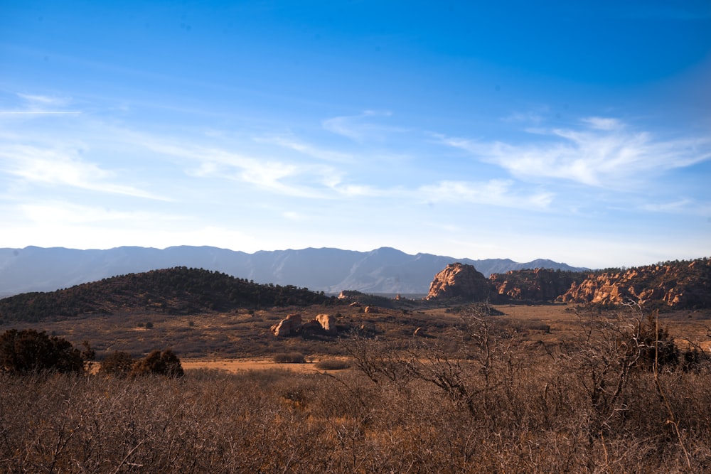 brown mountains under blue sky during daytime