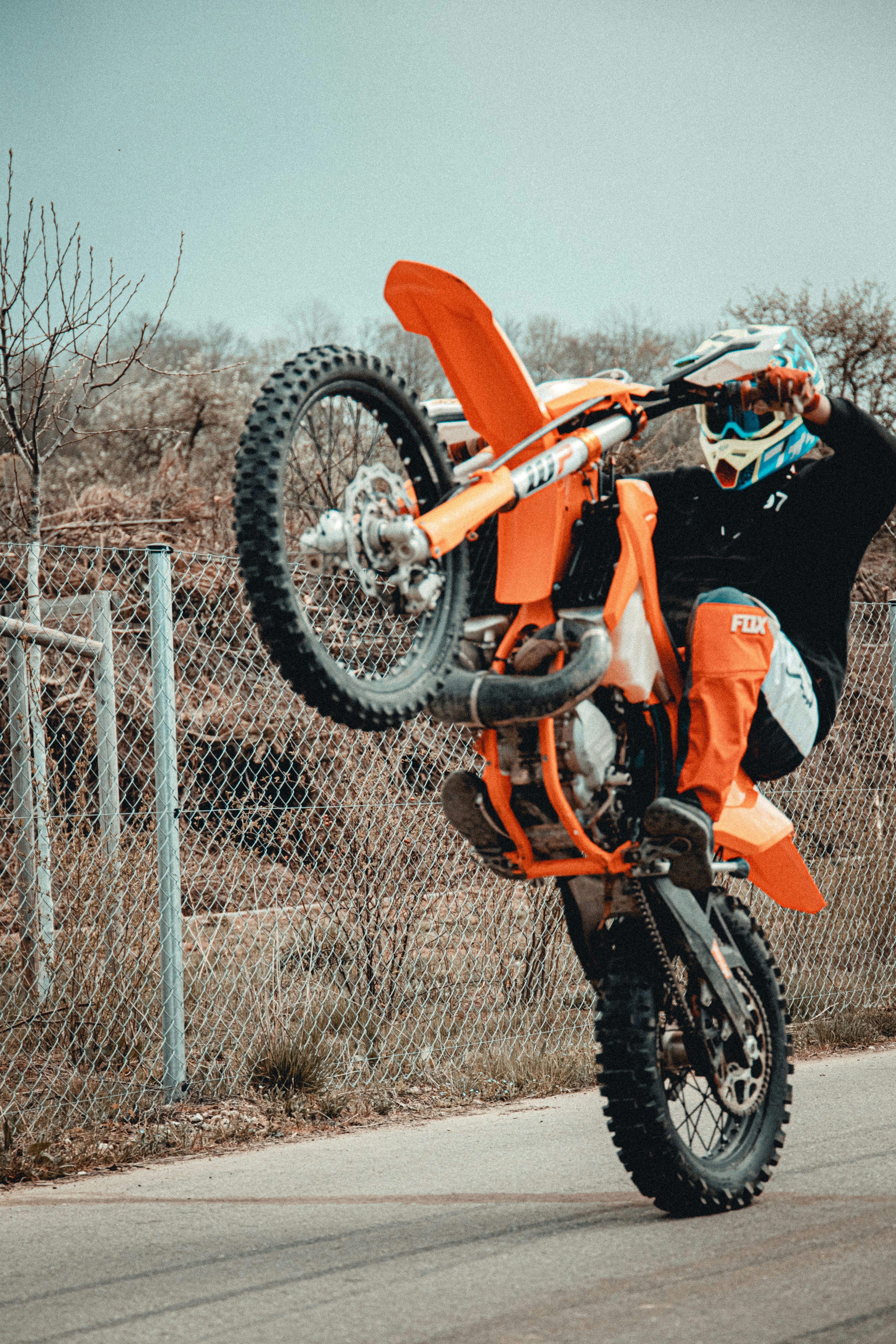black and orange dirt bike
