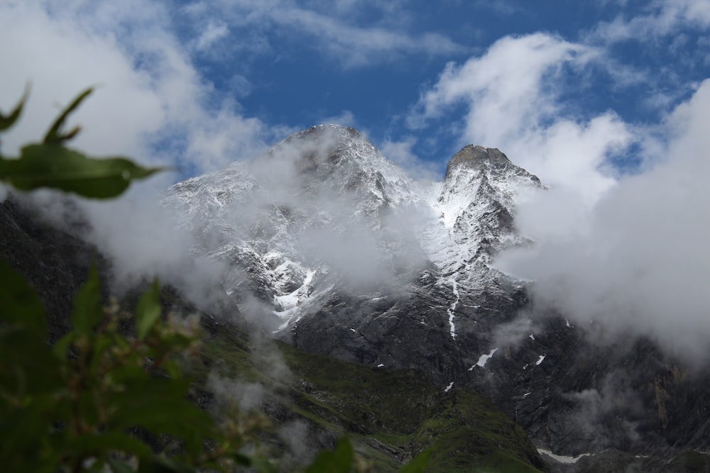 snow covered mountain under blue sky during daytime