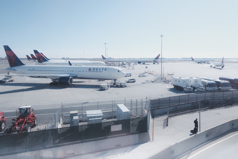 white passenger plane on airport during daytime