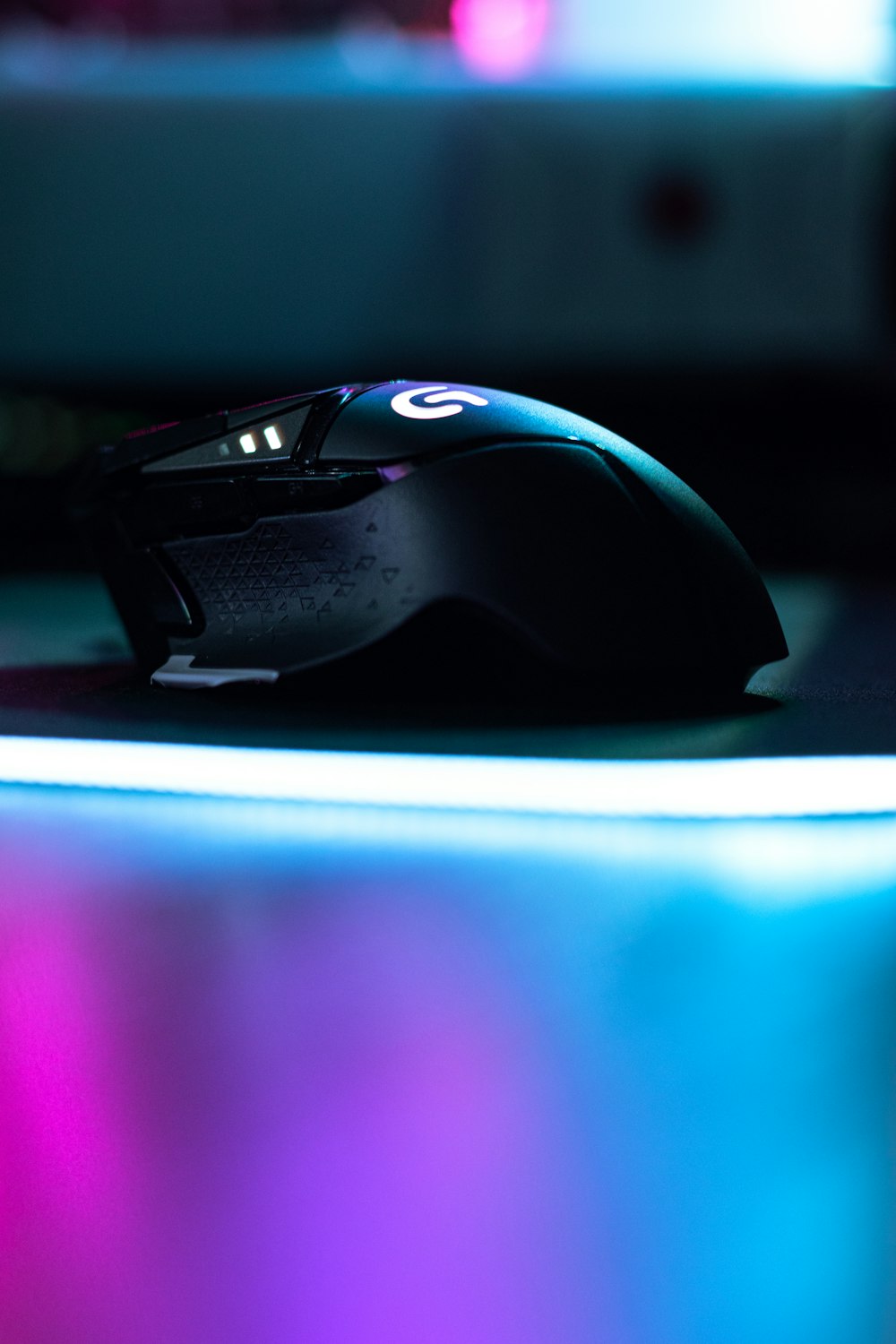 black and purple gaming mouse
