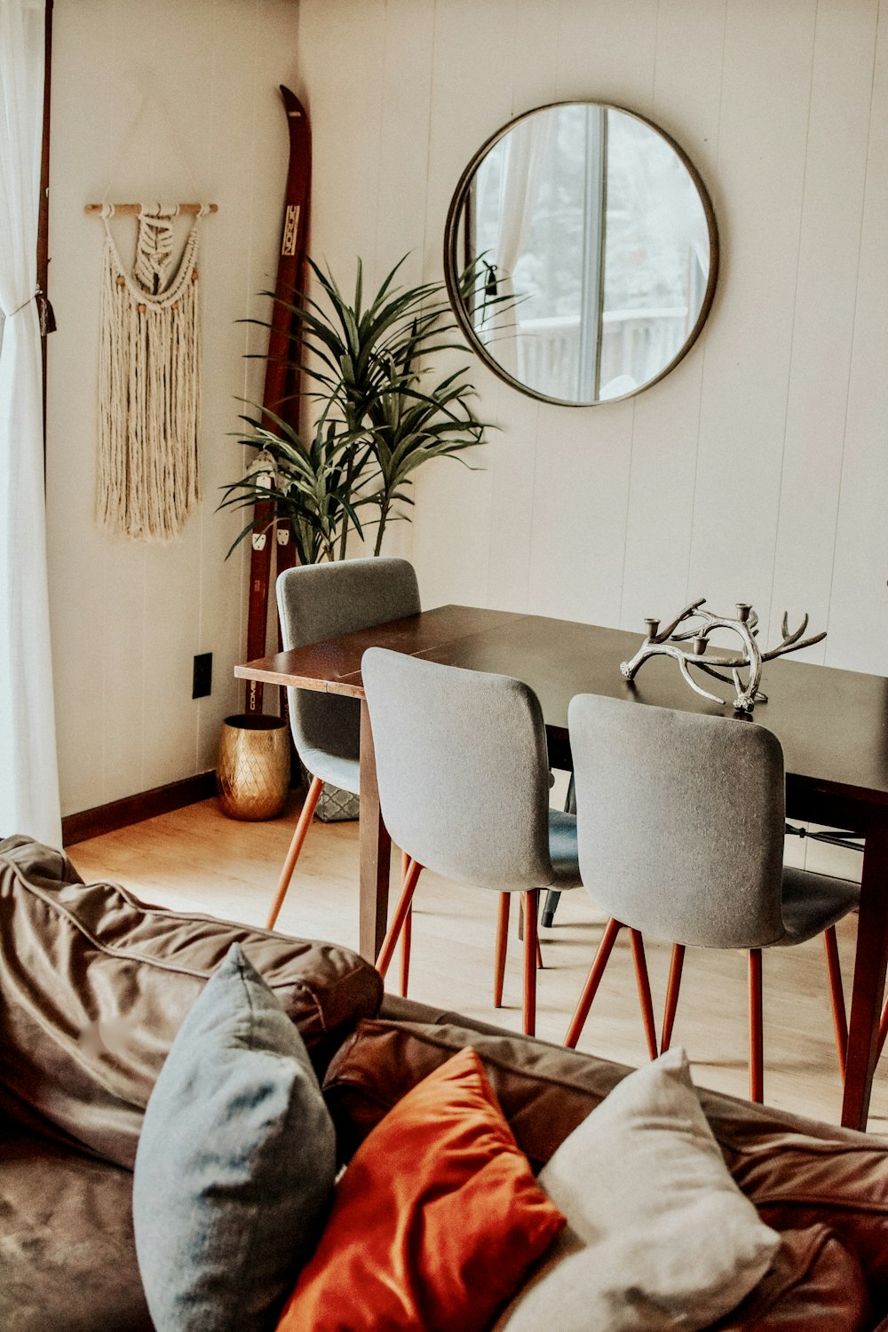 gray and brown wooden chairs