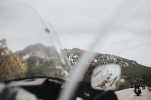 Bm 12 cruising through a scenic mountain trail, capturing its adventurous spirit.