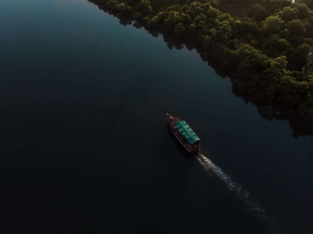 aerial view of boat on water during daytime
