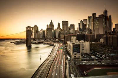 City skyline view showing Brooklyn, Queens, and Manhattan neighborhoods.
