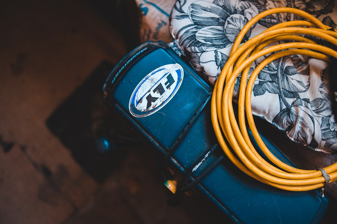 blue and yellow electric cable