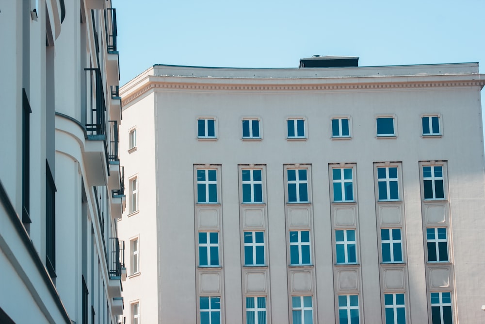 brown concrete building under blue sky during daytime