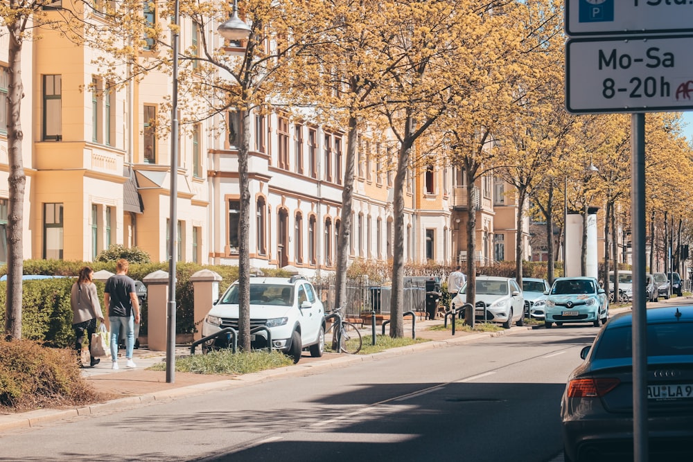 cars parked on side of the road during daytime