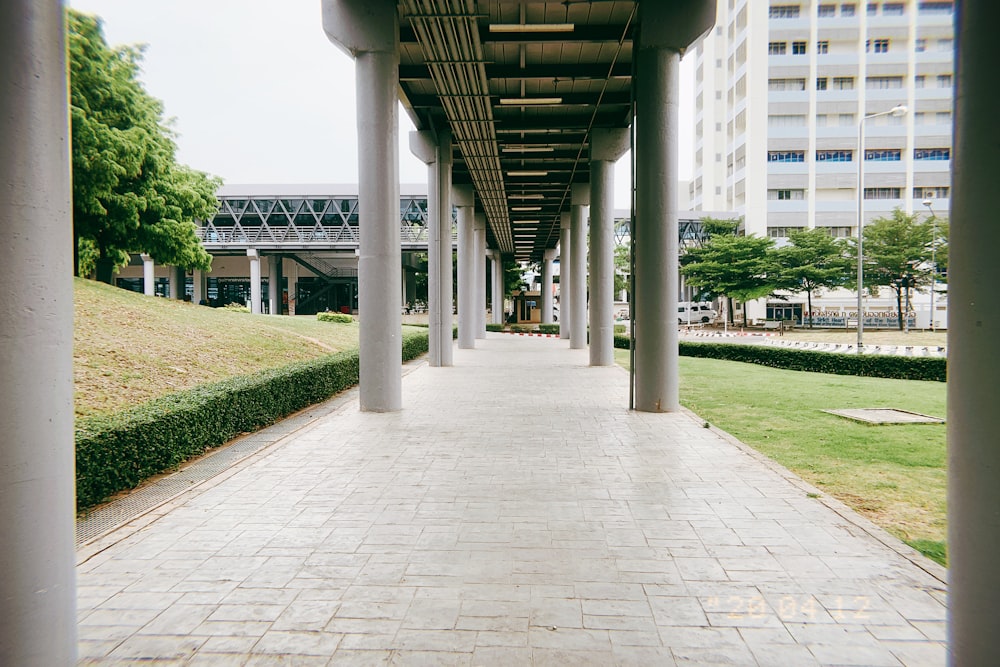 white concrete building near green grass field during daytime