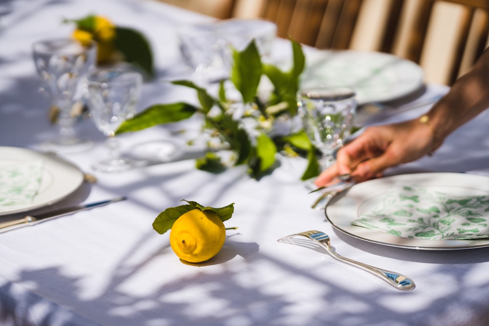 yellow lemon on white ceramic plate