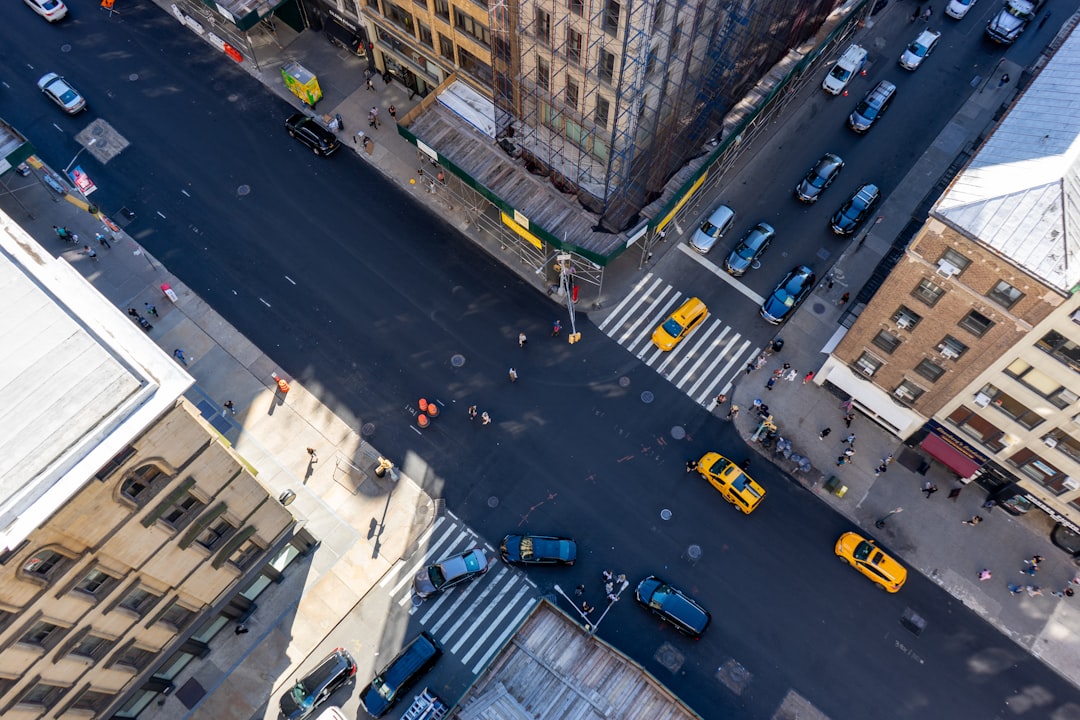 cars on road in city during daytime, Intersection