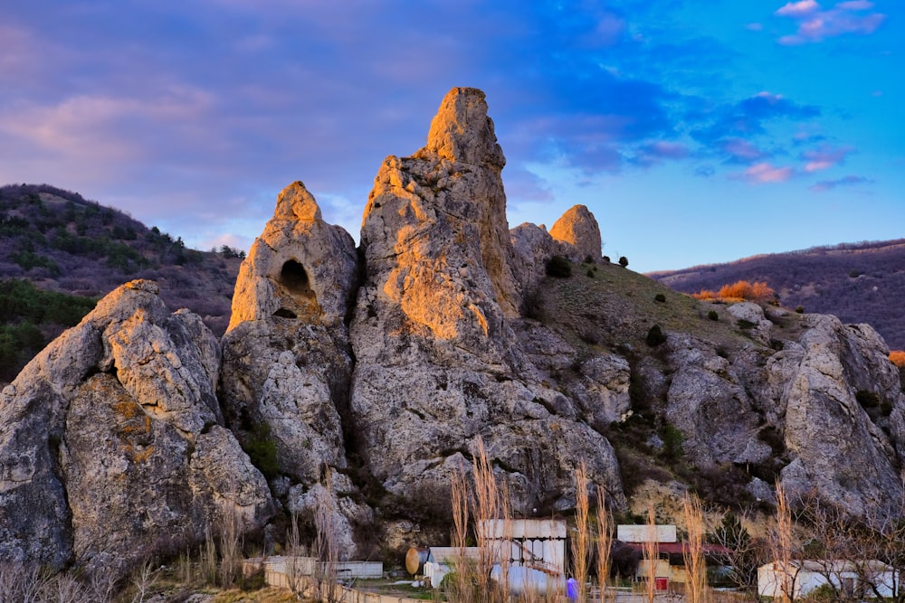 brown rock formation under blue sky during daytime