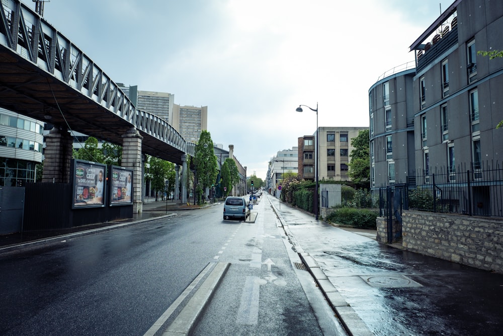 cars on road near buildings during daytime