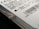 Close-up view of a hard drive with visible text and a barcode. The focus is on the details of the labeling, including technical specifications and a recognizable logo. The image captures the edge of the hard drive with a visible screw.