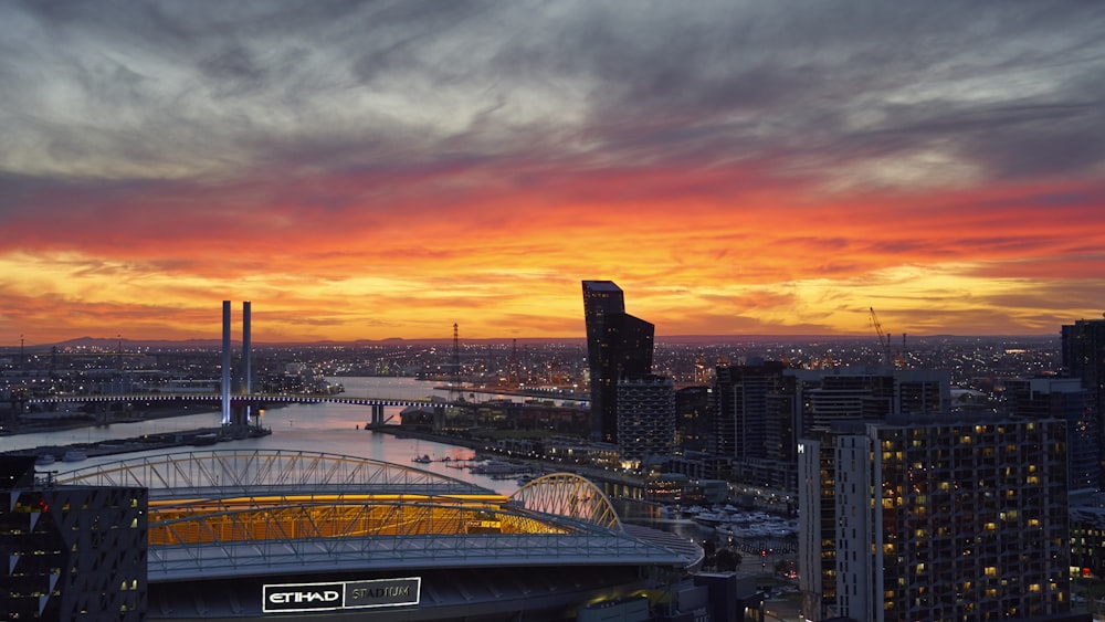 city skyline during orange sunset