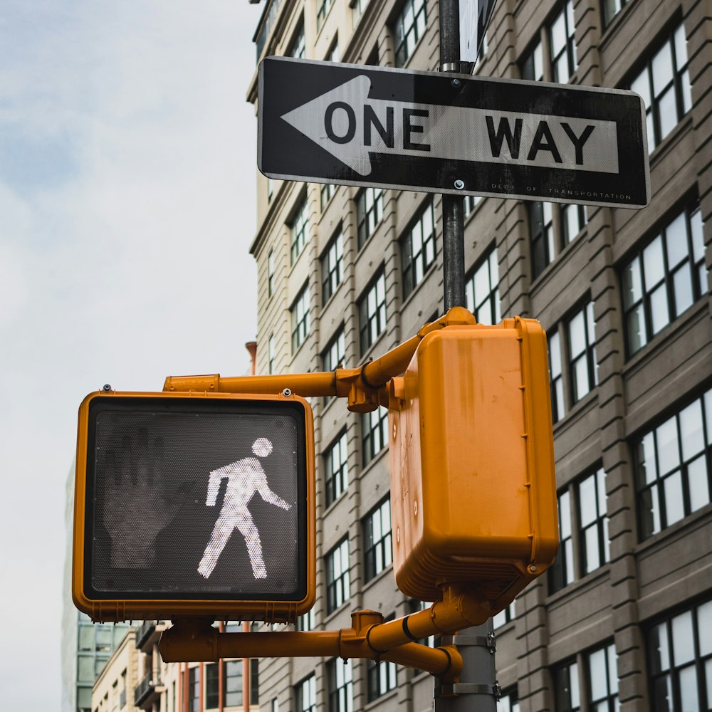 yellow and black street sign