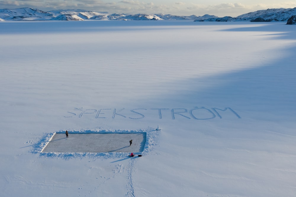 white snow on white sand