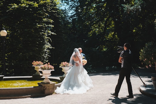 bride and groom walking on the street