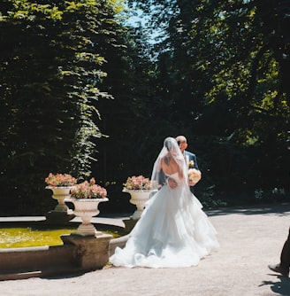 bride and groom walking on the street