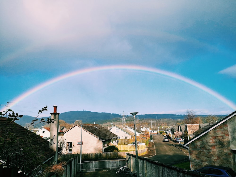 rainbow over houses and houses