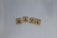 Four Scrabble tiles spelling the word SAFE are arranged horizontally on a textured white fabric background. Each tile has a letter with a corresponding point value in the lower right corner.