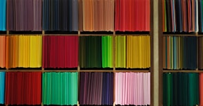 red green and black striped textile