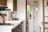 A modern kitchen space equipped with essential appliances for residents.