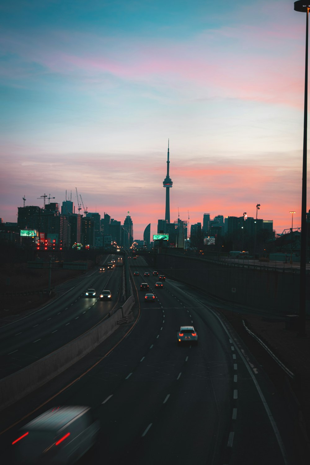 city with high rise buildings during sunset