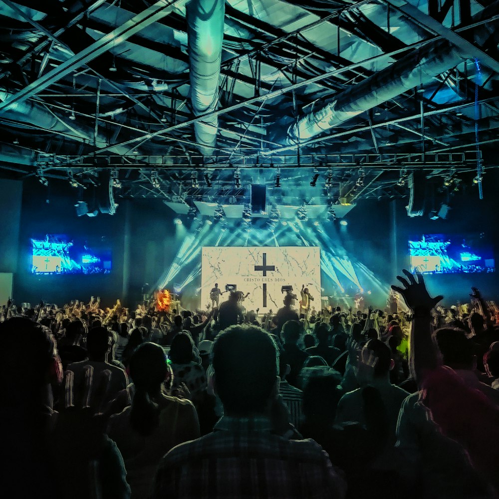 people gathering on concert during night time