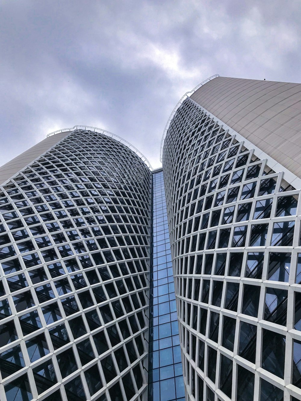 low angle photography of high rise building