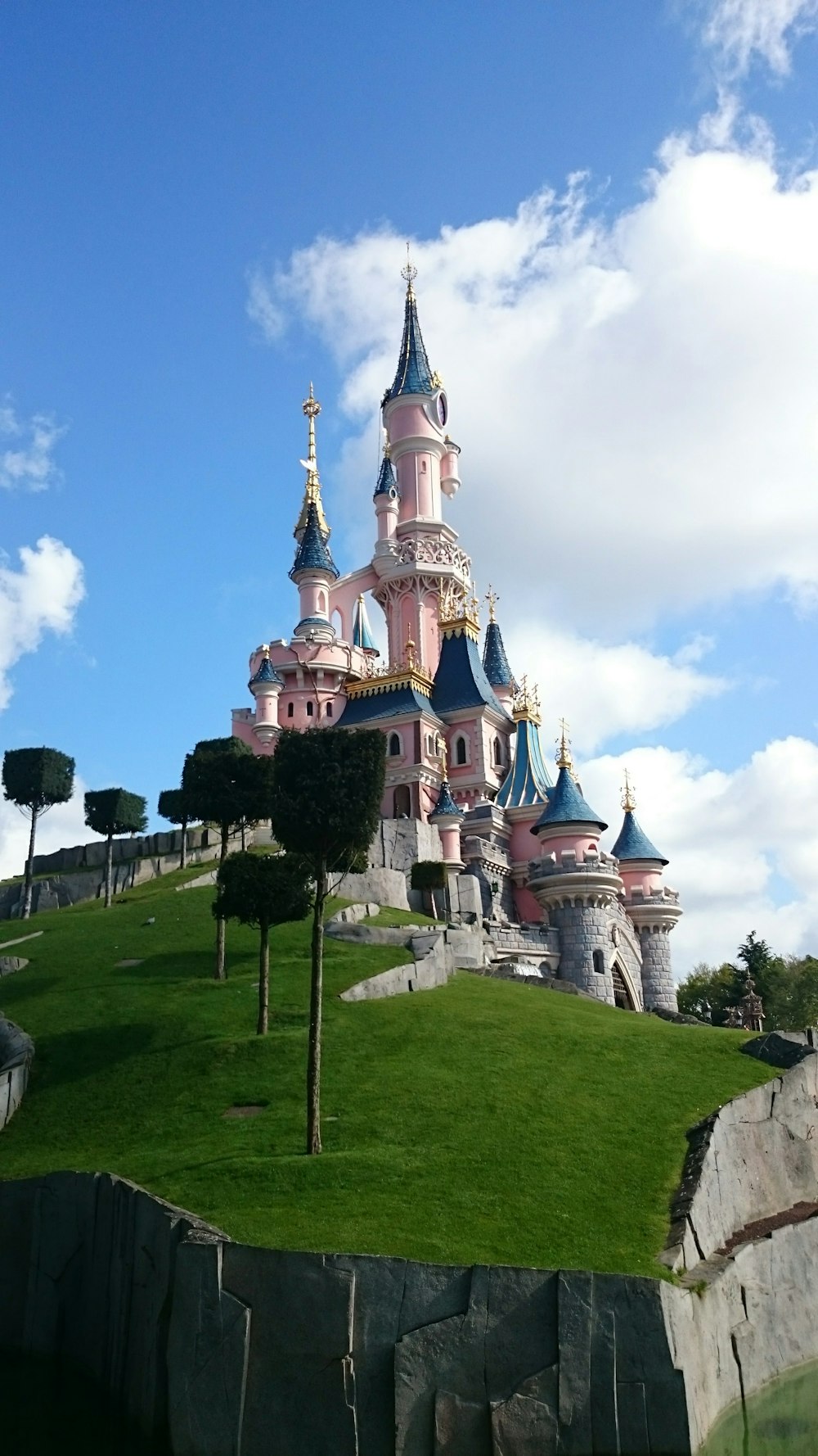 white and blue castle under blue sky during daytime