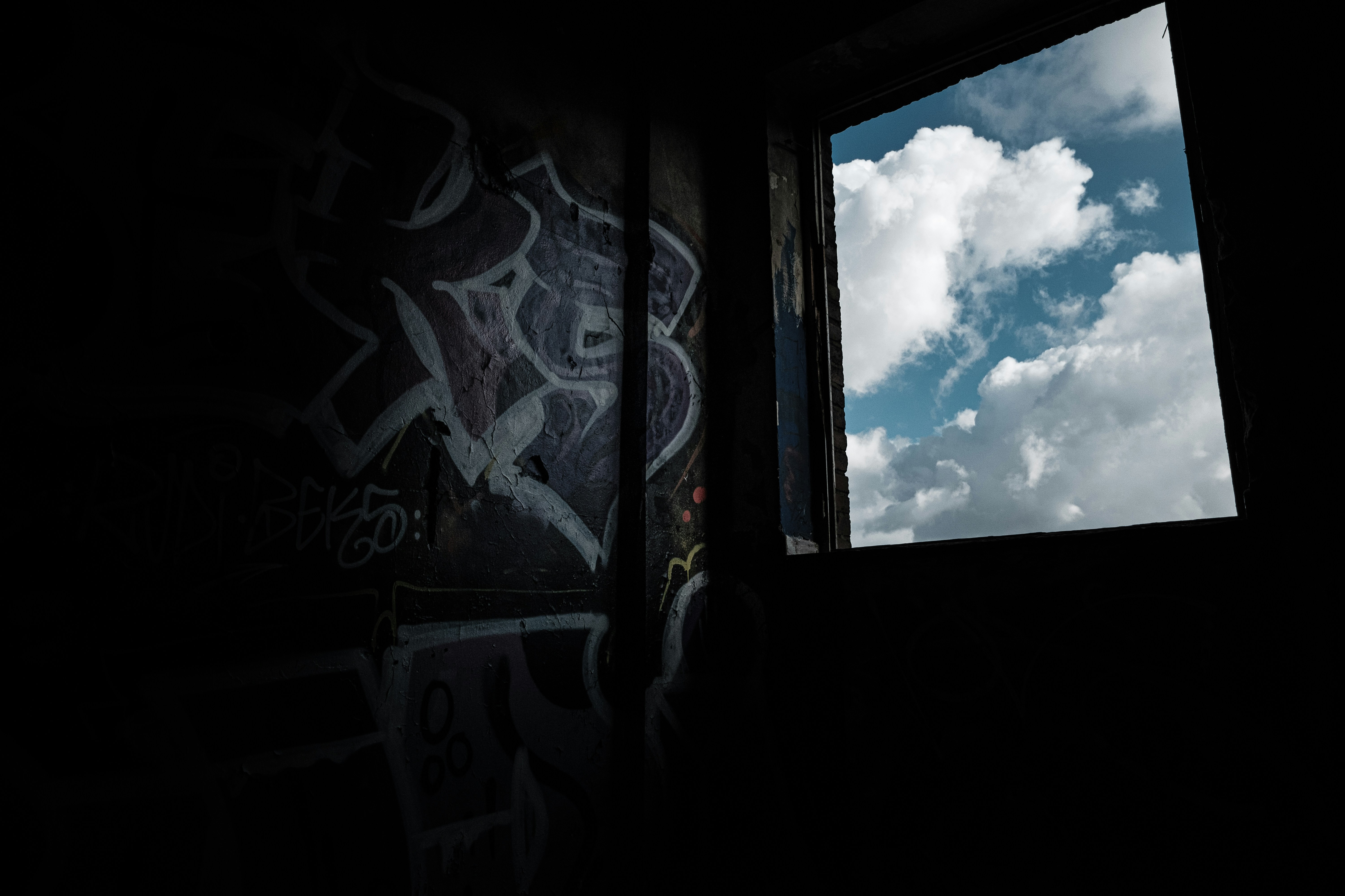 white blue and red graffiti on window