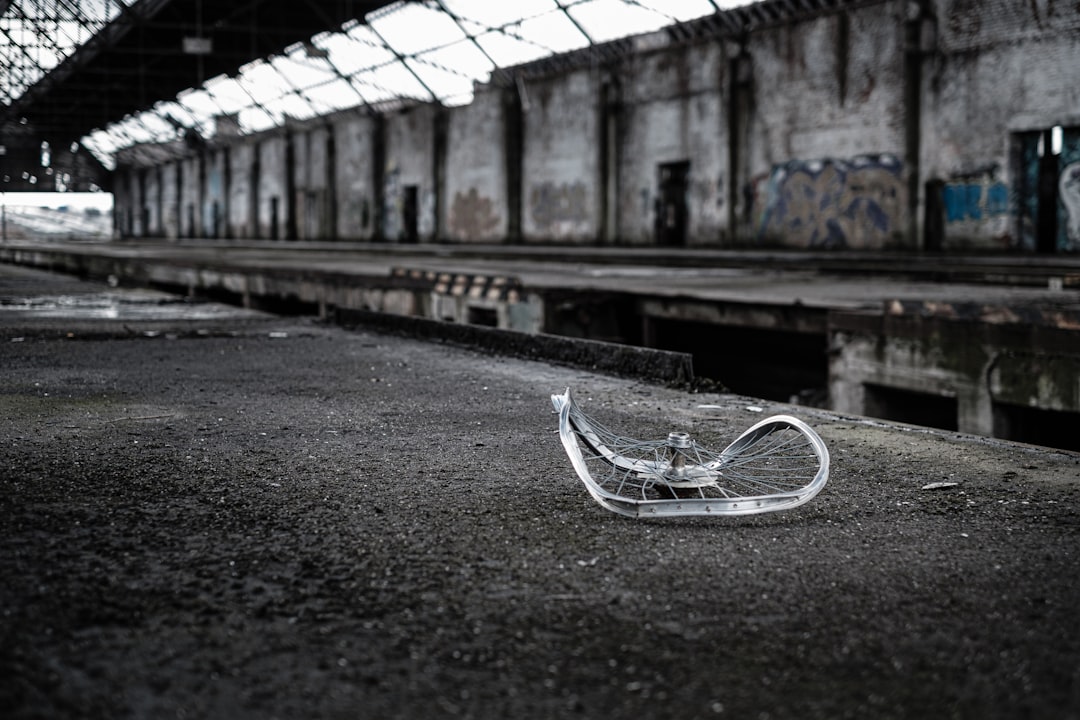 silver bicycle on gray asphalt road during daytime