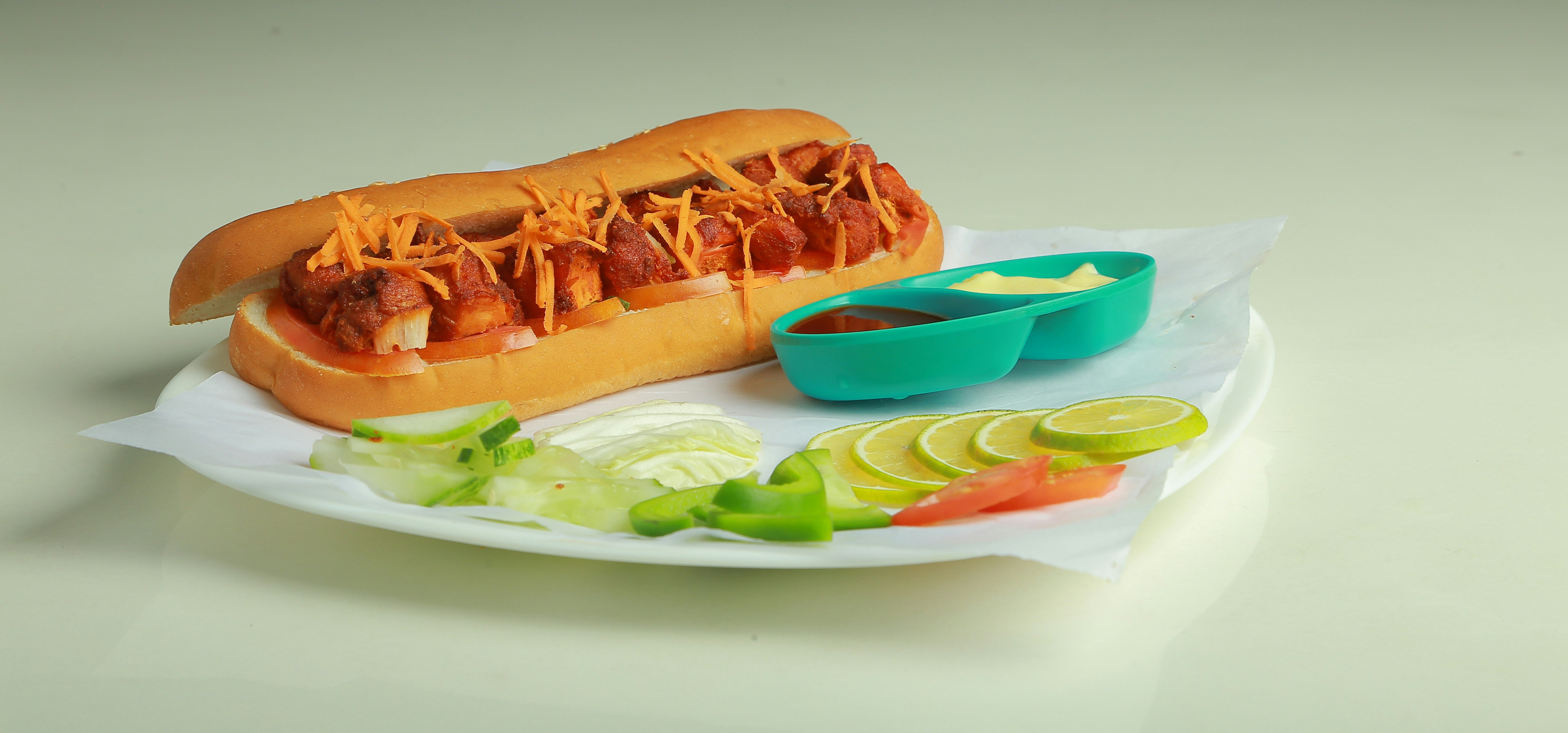 Hot dog with toppings and dip