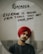 A reflective message is written on an oval mirror in bold, dark letters. The message reads: 'Remember everyone is healing from things they don't speak about.' In the background, a person wearing a red turban and dark clothing is faintly visible, reflected in the mirror but out of focus.